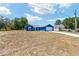 Charming blue single-story home with a two-car garage in a quiet neighborhood at 6570 Sw 129Th Loop, Ocala, FL 34473