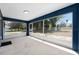 Covered lanai with screened windows offering tranquil views, great for outdoor enjoyment at 6570 Sw 129Th Loop, Ocala, FL 34473