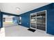 The screened-in patio features a sliding glass door and plenty of space for outdoor furniture at 6570 Sw 129Th Loop, Ocala, FL 34473
