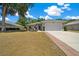Charming single-story home boasts a well-manicured lawn and a spacious two-car garage at 6791 Se 100Th Pl, Belleview, FL 34420