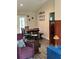 Cozy dining area adjacent to the living room and kitchen features stylish flooring and decor at 7488 Sw 204Th Ave, Dunnellon, FL 34431