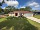 Attractive single-story home with a well-manicured lawn and a convenient two-car garage at 7488 Sw 204Th Ave, Dunnellon, FL 34431