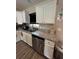 Kitchen with white cabinets, granite counters, stainless steel appliances, and under-mount sink at 7488 Sw 204Th Ave, Dunnellon, FL 34431
