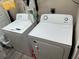 Laundry area featuring a washing machine and dryer at 7488 Sw 204Th Ave, Dunnellon, FL 34431