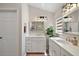 Bright bathroom features double sinks, modern fixtures, and natural light at 8545 Se 168Th Kittredge Loop, The Villages, FL 32162