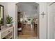 Open foyer with hardwood floors and views of the living spaces at 8545 Se 168Th Kittredge Loop, The Villages, FL 32162
