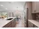 Modern kitchen with sleek cabinetry, stainless steel appliances, and a bright, open atmosphere at 8545 Se 168Th Kittredge Loop, The Villages, FL 32162