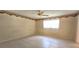 A well lit bedroom with tiled floors and window overlooking the outside at 8653 Sw 95Th Ln # F, Ocala, FL 34481