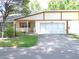 Charming single-story home featuring a well-manicured lawn and a two-car garage at 8653 Sw 95Th Ln # F, Ocala, FL 34481