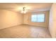 Spacious living room with tile flooring and a ceiling fan at 8653 Sw 95Th Ln # F, Ocala, FL 34481