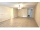 Spacious living room with tile flooring and a ceiling fan at 8653 Sw 95Th Ln # F, Ocala, FL 34481
