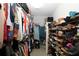 Walk-in closet with plentiful storage for clothes, shoes, and accessories, making organization simple at 9129 Sw 193Rd Cir, Dunnellon, FL 34432