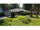 Charming single-story home featuring a well-manicured front yard and attached two-car garage at 9129 Sw 193Rd Cir, Dunnellon, FL 34432