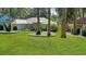 Attractive single story home with mature shade trees and healthy lawn with manicured landscaping at 9129 Sw 193Rd Cir, Dunnellon, FL 34432