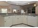 Bright kitchen with ample counter space and breakfast bar at 9129 Sw 193Rd Cir, Dunnellon, FL 34432