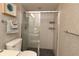 Bright and clean tiled shower stall with glass door and chrome hardware at 9129 Sw 193Rd Cir, Dunnellon, FL 34432