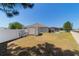 Fenced backyard with shed and screened-in pool and patio area at 9595 Sw 51St Cir, Ocala, FL 34476