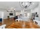 Open-concept layout featuring the dining area, living room, and kitchen, perfect for entertaining at 9595 Sw 51St Cir, Ocala, FL 34476