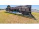 Screened pool and spa with patio seating provide relaxing outdoor living at 9595 Sw 51St Cir, Ocala, FL 34476