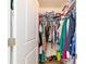 Spacious walk-in closet with ample storage and organized shelving for clothes, shoes, and accessories at 9595 Sw 51St Cir, Ocala, FL 34476