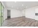 Bright, open living space with hardwood floors and recessed lighting at 9871 Sw 105Th Ct, Ocala, FL 34481