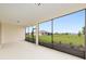 Screened patio with beautiful views of the backyard and surrounding community at 9871 Sw 105Th Ct, Ocala, FL 34481