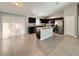 Gourmet kitchen featuring an island and stainless steel appliances in an open concept design at 9983 Sw 188Th Cir, Dunnellon, FL 34432