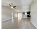 Open floor plan with living area featuring tile floors and open view to the kitchen at 9983 Sw 188Th Cir, Dunnellon, FL 34432