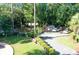 Convenient parking area with well-maintained landscaping, providing easy access to the park's amenities and river at 9983 Sw 188Th Cir, Dunnellon, FL 34432