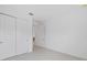 Bright bedroom featuring tile floors, closet with doors, and ample natural light at 10556 Sw 96Th Lane Rd, Ocala, FL 34481