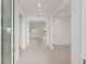Bright foyer with tile flooring offering an open view of the living spaces beyond at 10556 Sw 96Th Lane Rd, Ocala, FL 34481