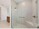 Bathroom with a large glass shower and a built-in seat at 10556 Sw 96Th Lane Rd, Ocala, FL 34481