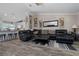 Comfortable living room featuring an open concept layout, plank flooring and neutral paint at 11806 Sw 61St Place Rd, Ocala, FL 34481