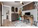 Functional home office featuring custom storage, desk space and modern furnishings at 11806 Sw 61St Place Rd, Ocala, FL 34481