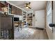 Inviting home office space featuring custom built-ins, desk area and natural light at 11806 Sw 61St Place Rd, Ocala, FL 34481