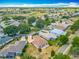 Aerial view of neighborhood showcasing golf course and community landscape at 11945 Se 171St Loop, Summerfield, FL 34491