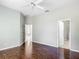 Main bedroom with hardwood floors and multiple entry points at 11945 Se 171St Loop, Summerfield, FL 34491