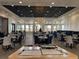 Bright, airy restaurant space with plentiful windows, modern decor, and comfortable seating arrangements at 11945 Se 171St Loop, Summerfield, FL 34491