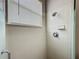 Shower with tile surround and brushed nickel fixtures at 11945 Se 171St Loop, Summerfield, FL 34491