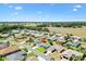 Aerial view of property in a neighborhood, highlighted with a red pin at 12147 Se 173Rd Pl, Summerfield, FL 34491