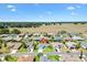 Aerial view of property in a neighborhood, highlighted with a red pin at 12147 Se 173Rd Pl, Summerfield, FL 34491