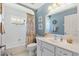 Charming bathroom with a tub and updated vanity at 12147 Se 173Rd Pl, Summerfield, FL 34491