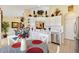Bright kitchen featuring white cabinets, stainless steel appliances and a breakfast nook at 12147 Se 173Rd Pl, Summerfield, FL 34491