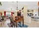 Open living space with dining area and living room, perfect for entertaining at 12147 Se 173Rd Pl, Summerfield, FL 34491