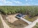 An aerial perspective showcases the home's placement within a vast landscape at 12689 Sw 81St St, Dunnellon, FL 34432