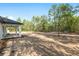 A view of the backyard area with the covered patio at 12689 Sw 81St St, Dunnellon, FL 34432