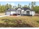 Attractive single-story home with a two-car garage and manicured lawn at 12689 Sw 81St St, Dunnellon, FL 34432