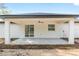 Covered patio features a ceiling fan and access to the home's interior through sliding glass doors at 12689 Sw 81St St, Dunnellon, FL 34432