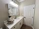 Elegant bathroom featuring a marble countertop, modern fixtures, and stylish decor, providing a clean and sophisticated look at 13430 Ne 30Th Ct, Anthony, FL 32617