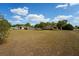 Expansive backyard showcasing the home's generous lot size, perfect for outdoor activities at 14555 Se 98Th Ave, Summerfield, FL 34491
